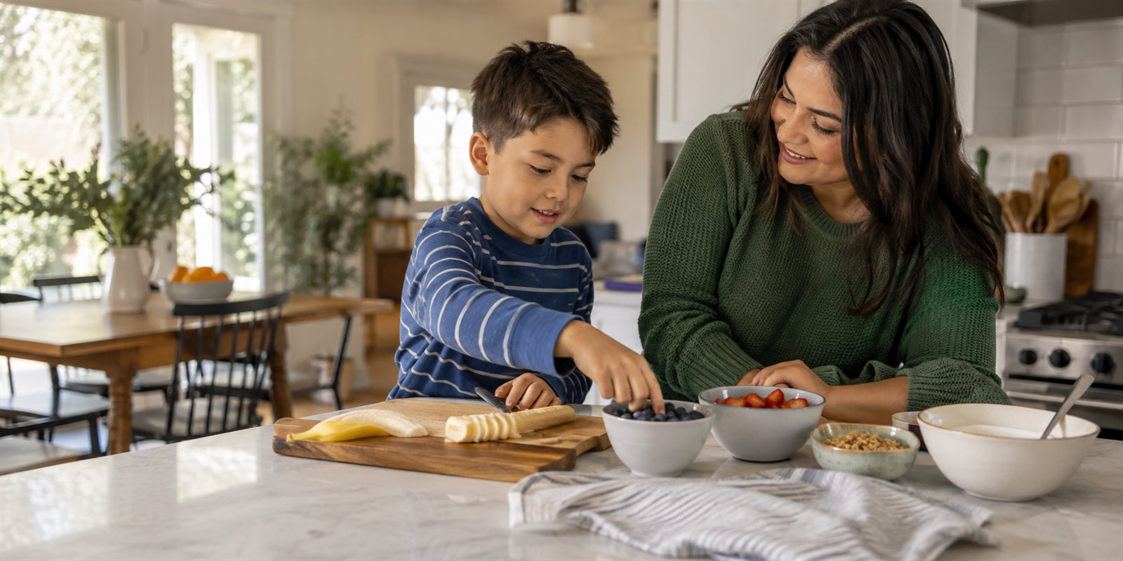 A parent and child preparing a snack together and practicing everyday independence